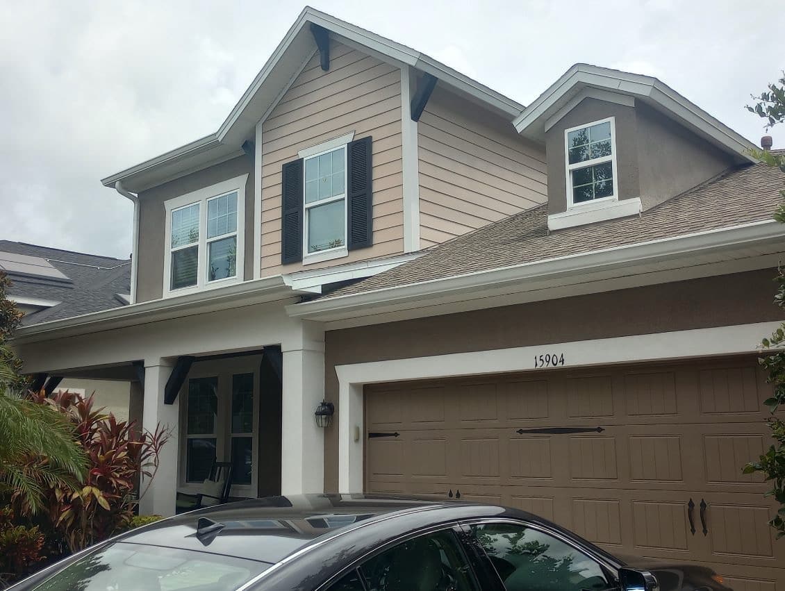 a house with a car parked in front of it